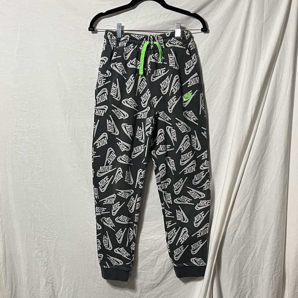 Nike Kids Black and White Logo Joggers with Green Drawstring